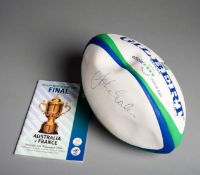 A 1999 Rugby World Cup replica ball signed by the winning captain John Eales,