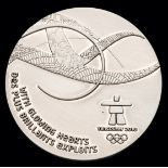 A Vancouver 2010 Winter Olympic Games participant's medal,
Silvered metal, 60mm,