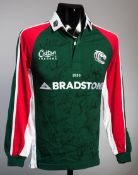 A youth-sized Leicester Tigers rugby shirt signed by the 2002 Heineken Cup winning team,