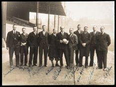 A fully-signed press photograph of the Arsenal team that achieved the club's first major honour