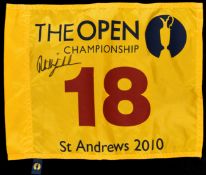 A souvenir 2010 Open Championship St Andrews 18th hole pin flag signed by five-times major winning