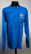 A replica blue Manchester United 1968 European Cup Final jersey signed by 9 of the winning players,