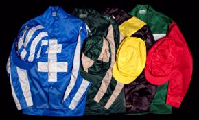 Four sets of racing silks one in the colours of the late Sir Peter O'Sullevan,