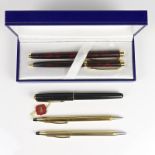 A collection of five pens. Comprising of