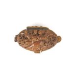A finely carved coquilla nut snuff box,