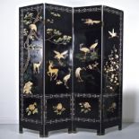 A large Chinese black lacquered four fol