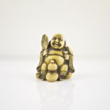 A Japanese ivory netsuke of Hotei, 19th