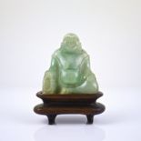 A small Chinese jade figure of Buddha, 2