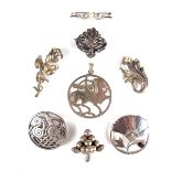 Collection of eight silver brooches.