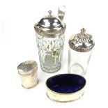 A group of four early/mid 19th century silver and glass condiments.