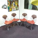 A group of four Charles and Ray Eames wire dining chairs, post 1951.