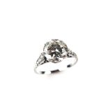 Platinum diamond solitaire ring. The round brilliant cut diamond weighing approx. 1.