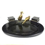 A large black marble and brass desk inkstand.
