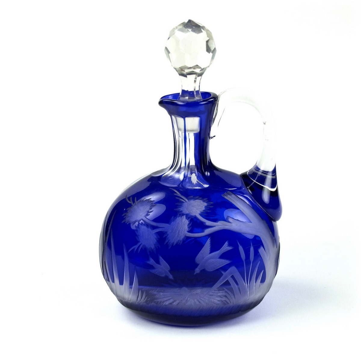 A Victorian engraved Bristol blue glass decanter. - Image 2 of 2