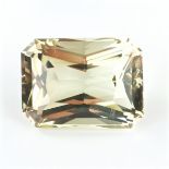 Loose emerald cut citrine. Weight 30.14 cts.