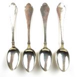 A set of four Danish silver dessert spoons.