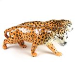 Two Beswick leopards.