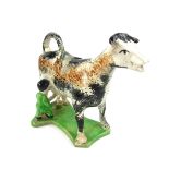 A Staffordshire pottery cow creamer, 19th century.