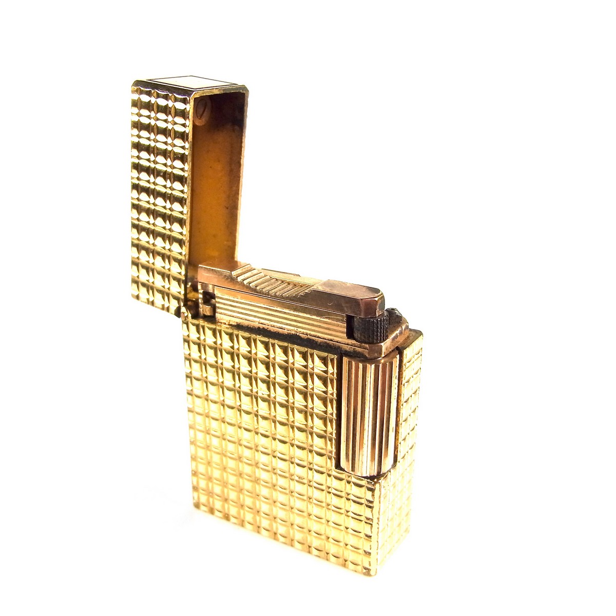 An ST Dupont briquet gold plated lighter.