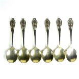 A set of six George V silver conserve spoons.