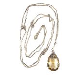 Silver citrine pendant necklace. Set with a large briolette cut citrine weighing approx. 35.