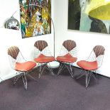 A group of four Charles and Ray Eames wire dining chairs, post 1951.