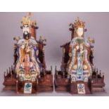 A Pair of Chinese Cloisonné, Rosewood and Faux Ivory Emperor and Empress, 20th Century.