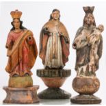 A Group of Three Carved Hardwood Santos Figures with Polychrome Decoration, 19th/20th Century.