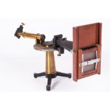 A Spectroscope, Late 19th/Early 20th Century. Lacking prisms. H: 26   W: 18   ins. Proceeds to