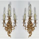 Coppia di appliques in bronzo dorato a quattro luci, XIX sec., H cm 50 Starting Price: €150