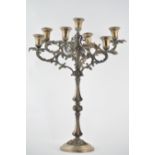 Candelabro in argento a sette luci, punzoni 800, 1098AL, XX sec., peso gr. 2160, H cm 46 Starting