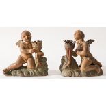Coppia di sculture portacero raffiguranti "Angeli"  in terracotta policroma, fine del XVIII sec. -