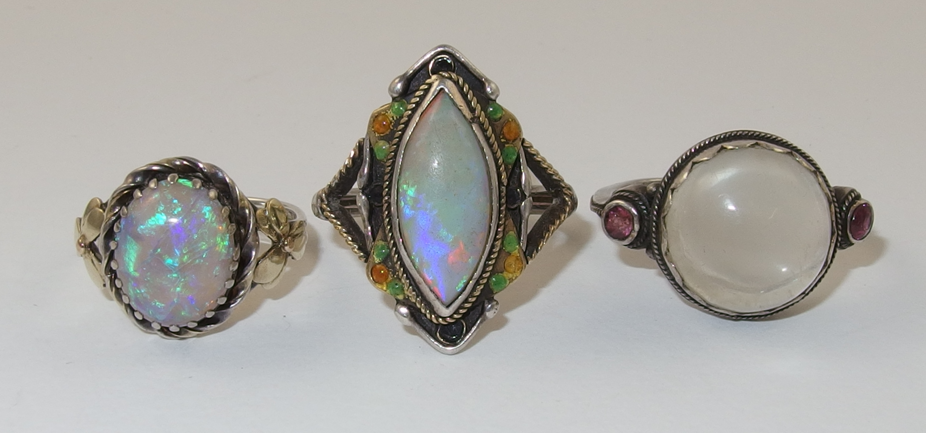 Three arts and crafts style rings comprising of a yellow and white metal ring set with a marquis - Image 6 of 12
