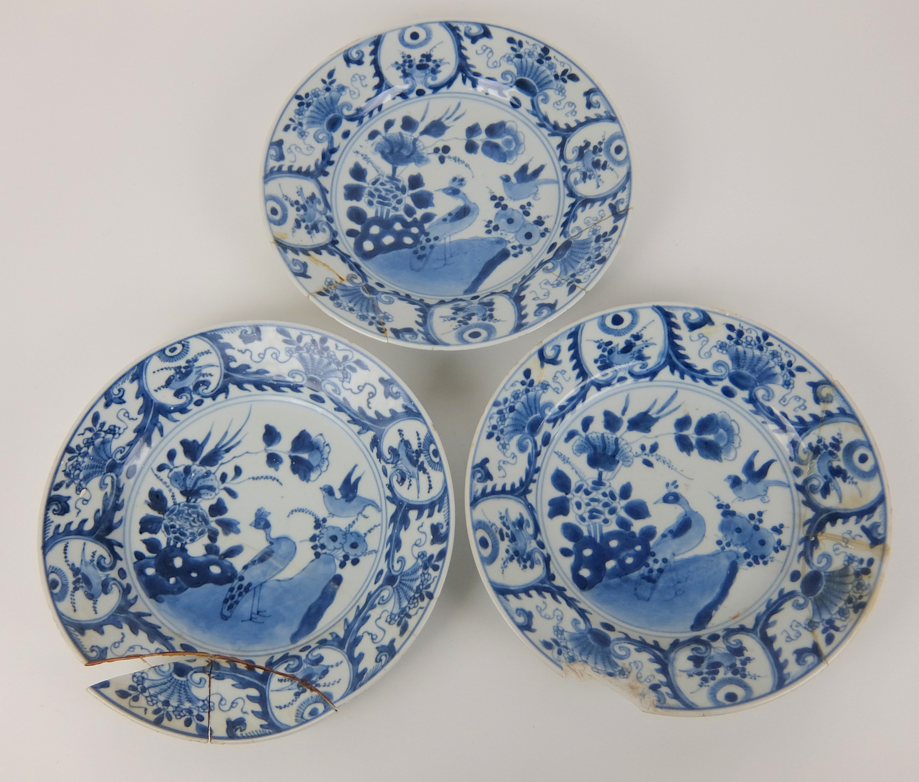 Two Chinese plates painted with a basket of flowers and a female garden (both cracked), 27.5cm - Image 8 of 12