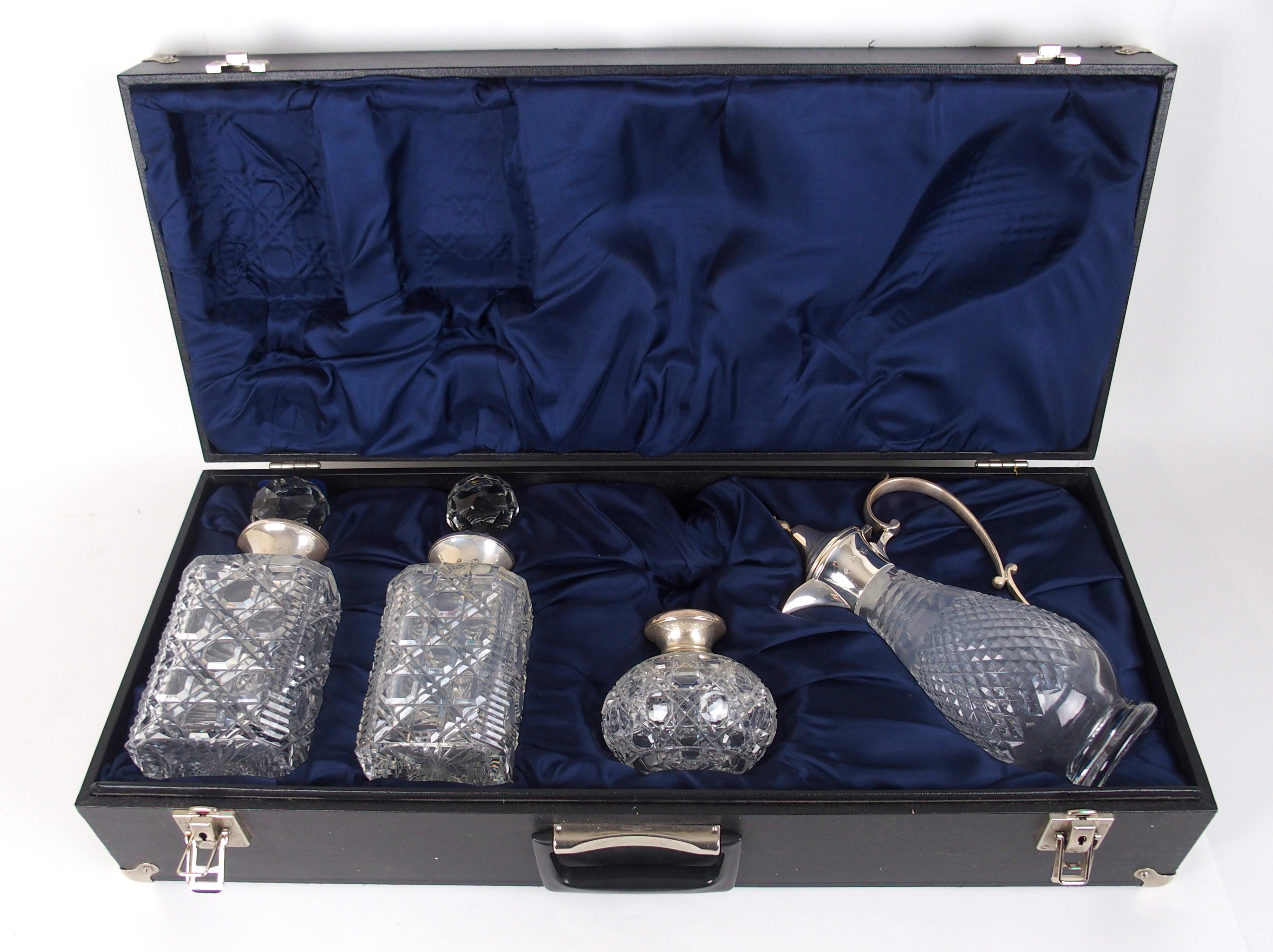 A decanter and scent bottle set by Argyll Silver, Birmingham 1987 comprising a pair of silver