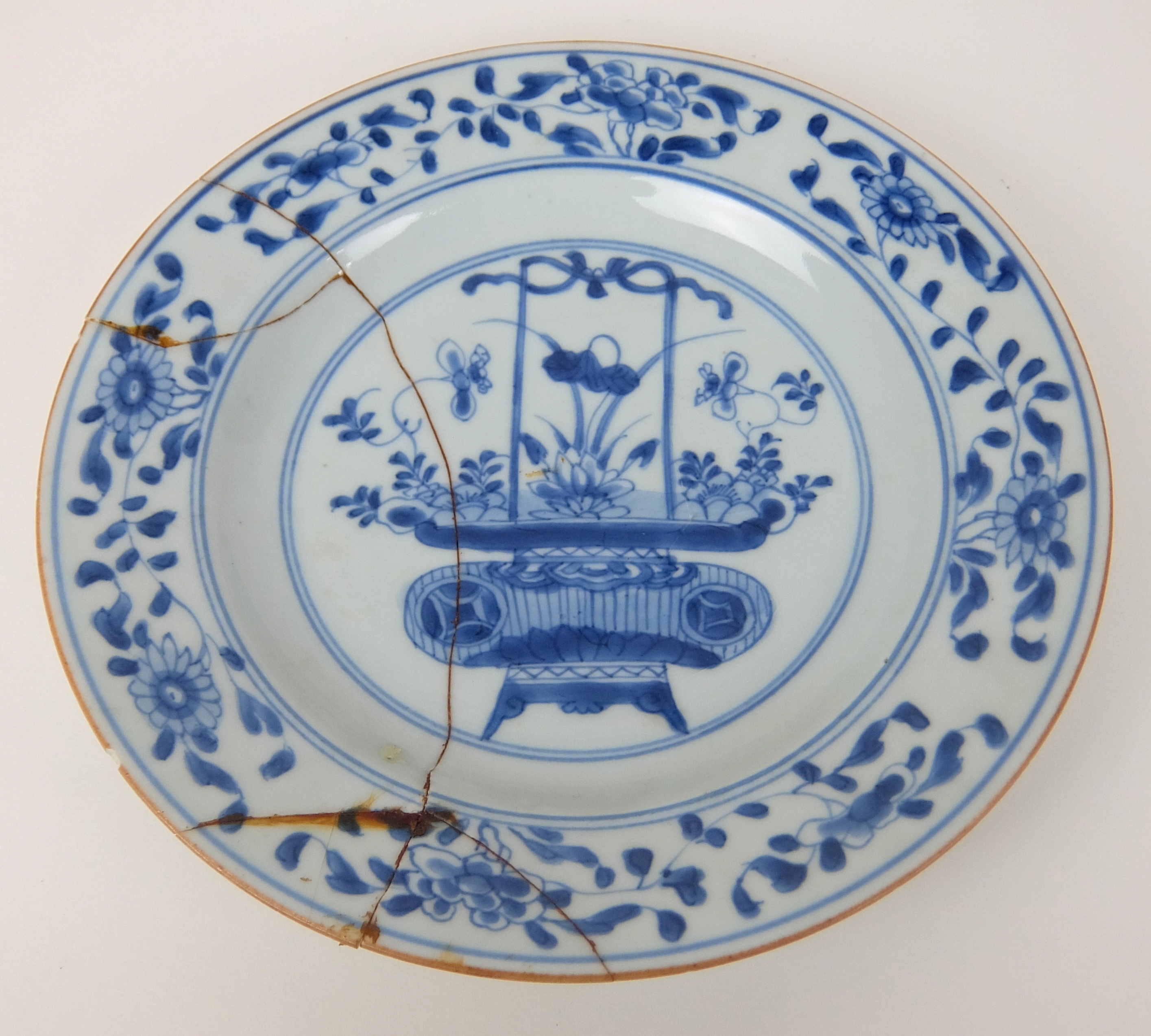 Two Chinese plates painted with a basket of flowers and a female garden (both cracked), 27.5cm - Image 7 of 12