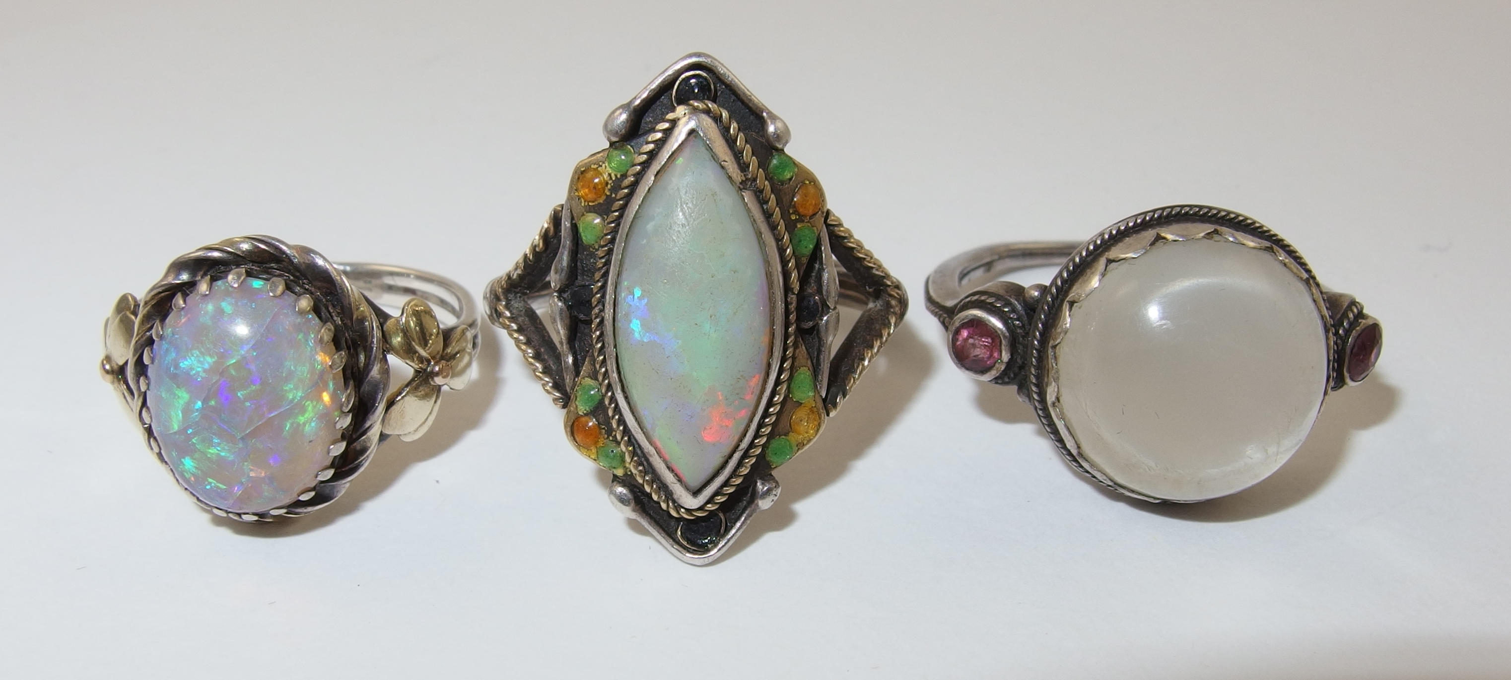 Three arts and crafts style rings comprising of a yellow and white metal ring set with a marquis - Image 4 of 12