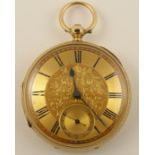 An 18ct open face pocket watch  with flower engraved gold coloured dial, black Roman numerals,