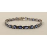 A sapphire and diamond bracelet comprising of twenty six Ceylon sapphires of approximately 6.5cts in