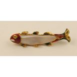 A fish brooch the body made from a single large freshwater pearl mounted in yellow metal and