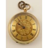 A 14ct small open faced pocket watch with gold coloured machine engraved dial with black Roman