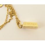 An 18ct Cartier gold ingot pendant  with hand engraved Cartier 1/8oz the back stamped with the