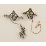 Two monkey brooches made in yellow and white metal, set throughout with clear gem stones, one of the