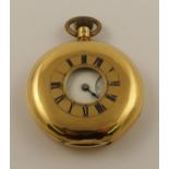 An 18ct half hunter pocket watch with blue enamelled chapter ring surrounding the aperture, white