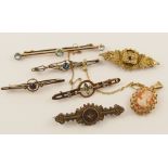 A collection of gold and yellow metal gem set brooches and a 9ct cameo pendant