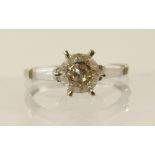 A 9ct champagne diamond ring with gem set shoulders