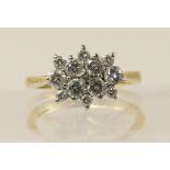 An 18ct diamond cluster ring of approx 1ct combined