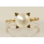 A 9ct pearl set ring