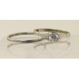 A platinum diamond solitaire of approx 0.30cts with a platinum wedding band
