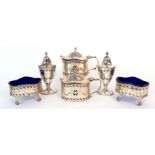 A cased six piece silver condiment set by Thomas Ducrow & Sons, Birmingham 1941, of oval shape